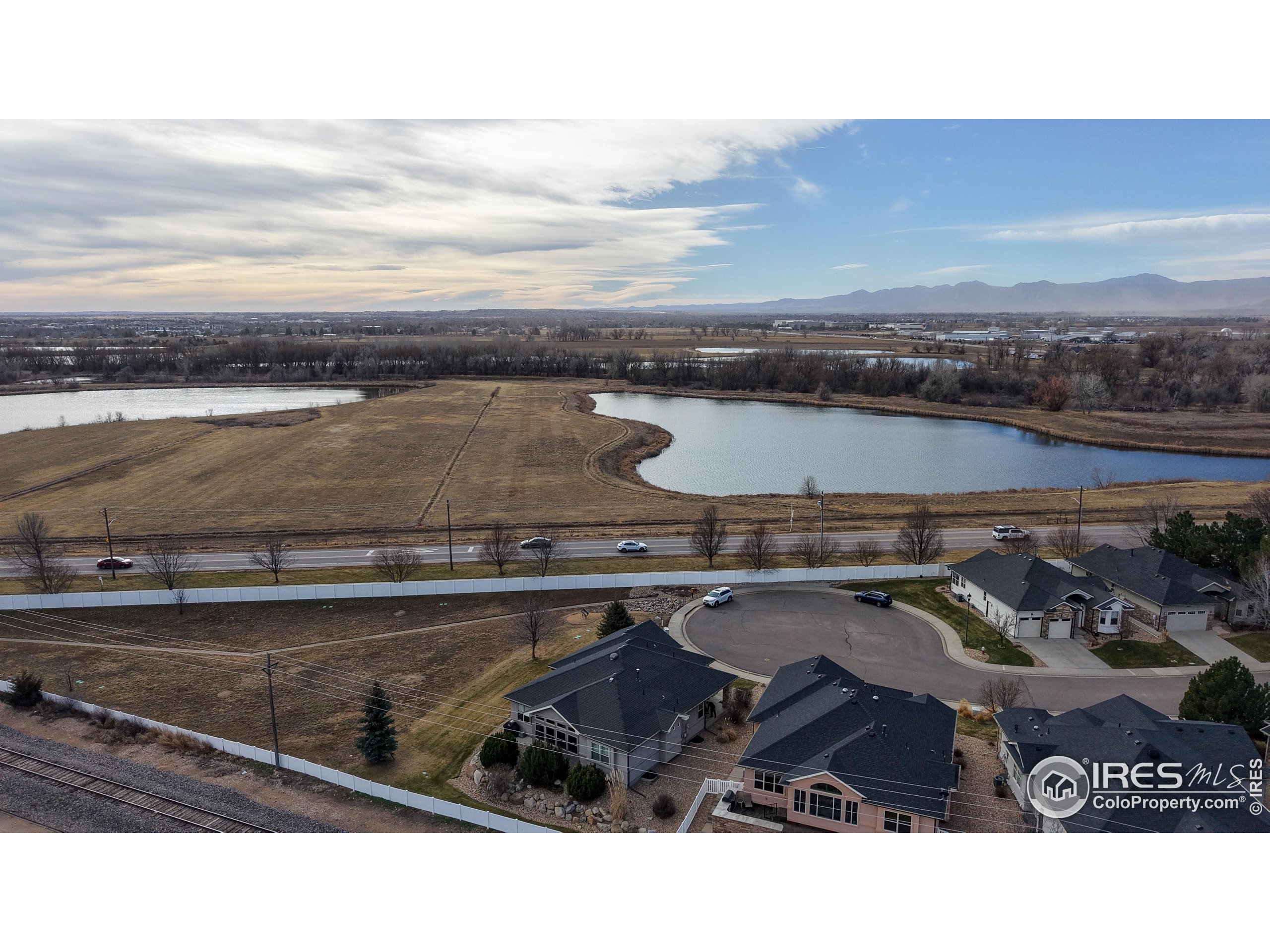 3602 Doral Place Longmont, CO 80503 - Photo 39 of 40 a picture of a lake view