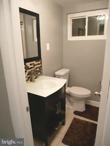 a bathroom with a sink and a toilet