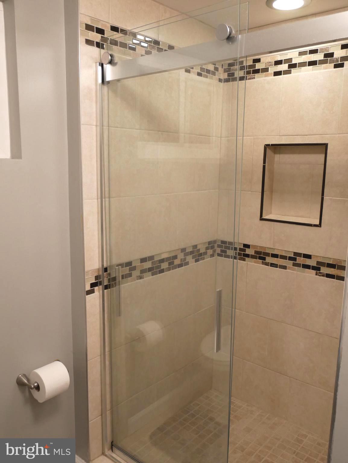 1805 Arcola Avenue, Unit A Silver Spring, MD 20902 - Photo 15 of 29 a bathroom with a shower