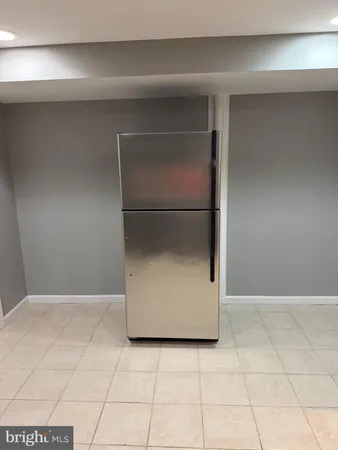 a utility room with cabinets