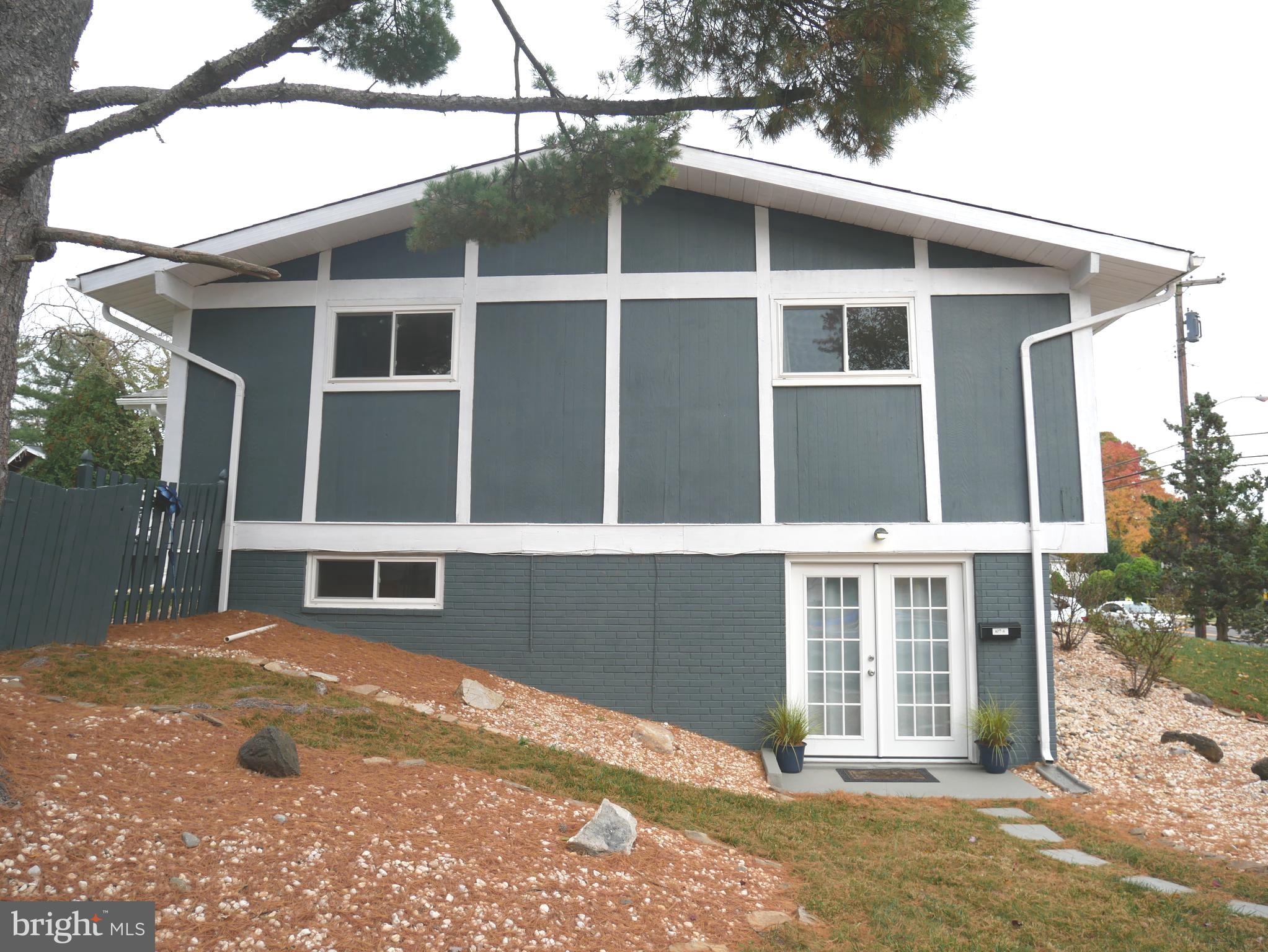 1805 Arcola Avenue, Unit A Silver Spring, MD 20902 - Photo 2 of 29 a view of a house with a backyard
