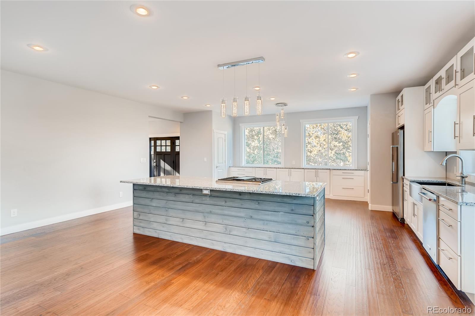 5967 High Drive Morrison, CO 80465 - Photo 12 of 38 a view of a kitchen counter tops and wooden floor