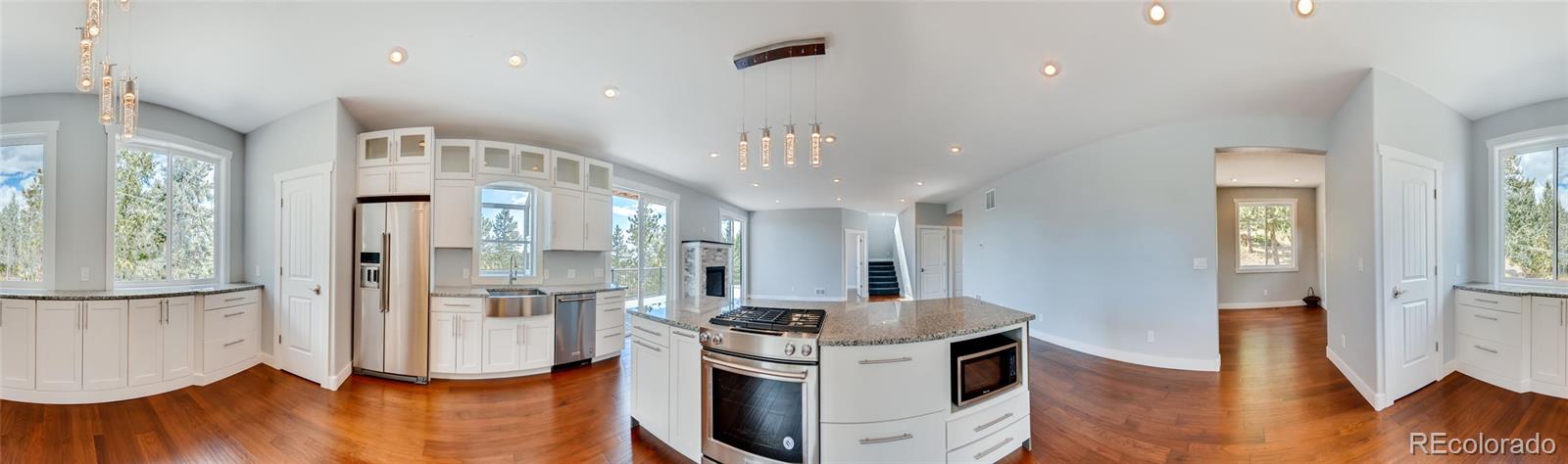 5967 High Drive Morrison, CO 80465 - Photo 16 of 38 a view of kitchen with cabinets and wooden floor