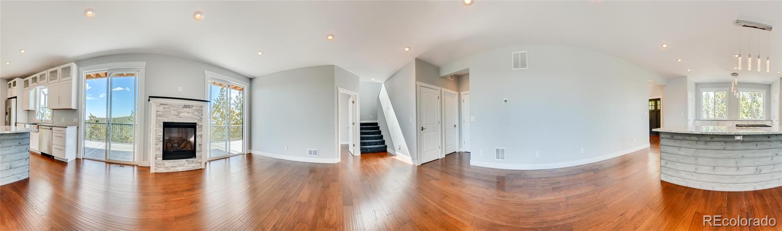 5967 High Drive Morrison, CO 80465 - Photo 18 of 38 a view of entryway and hall with wooden floor