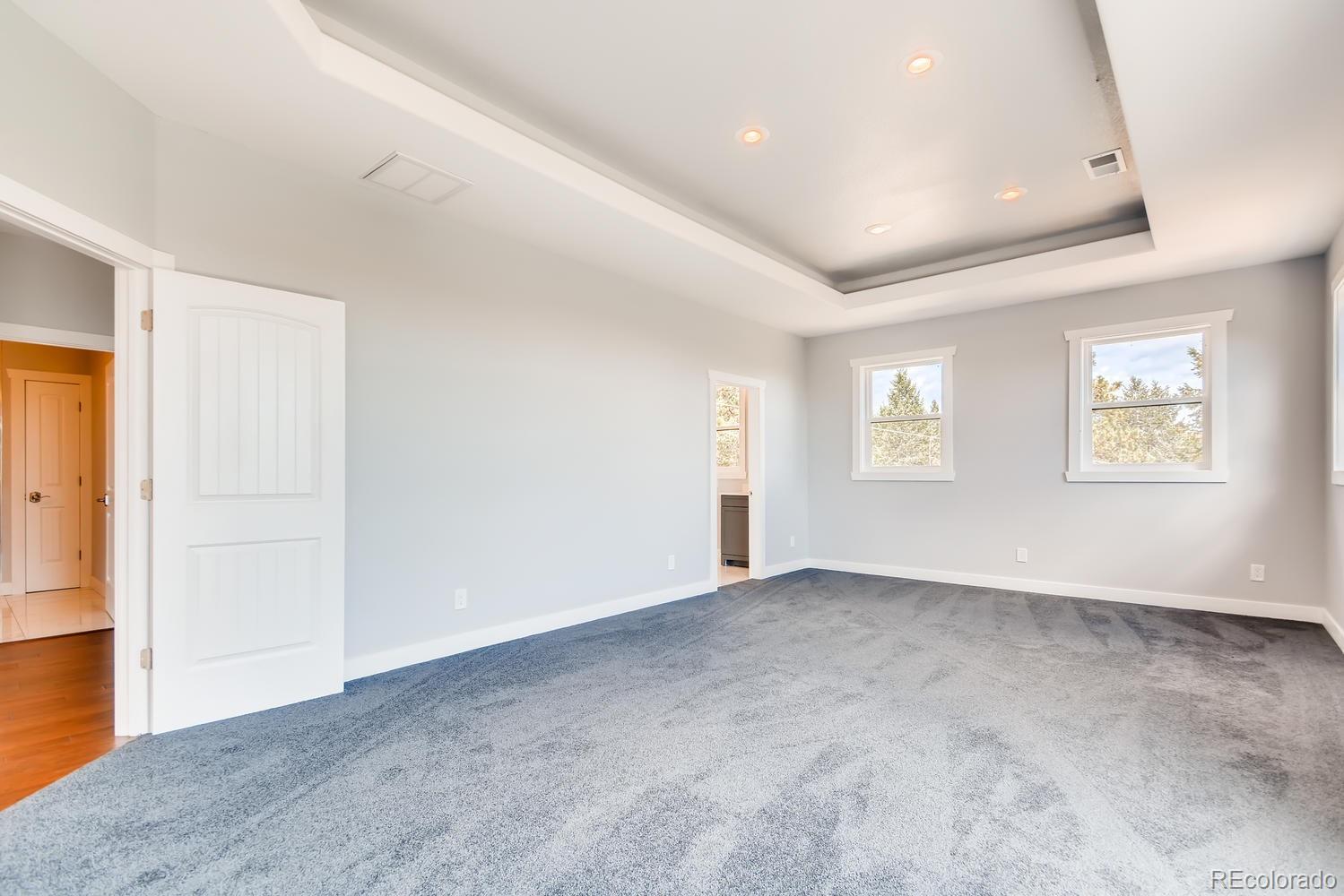 5967 High Drive Morrison, CO 80465 - Photo 20 of 38 an empty room with windows