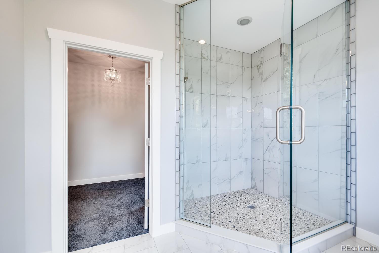 5967 High Drive Morrison, CO 80465 - Photo 25 of 38 a bathroom with a shower