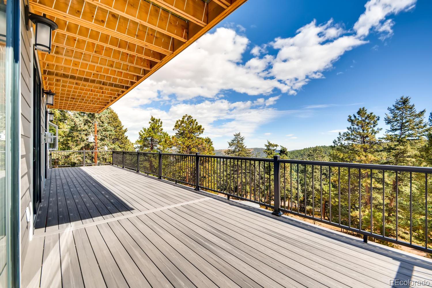 5967 High Drive Morrison, CO 80465 - Photo 33 of 38 a view of balcony with wooden floor