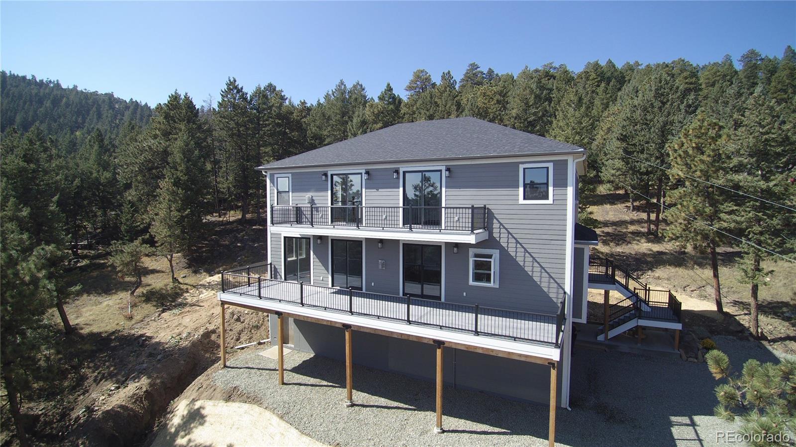 5967 High Drive Morrison, CO 80465 - Photo 36 of 38 a view of a house with a yard