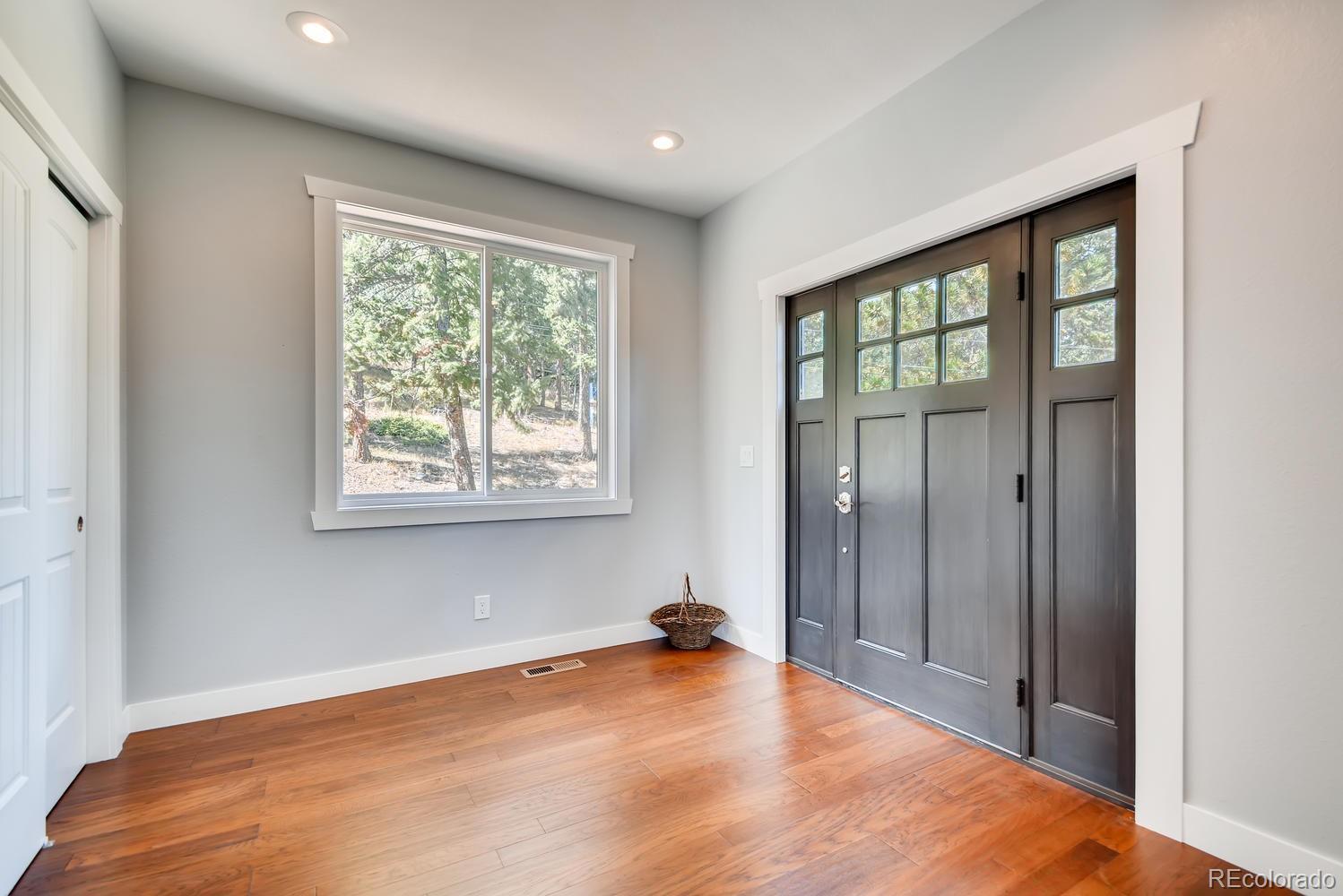5967 High Drive Morrison, CO 80465 - Photo 4 of 38 a view of a room with a large window