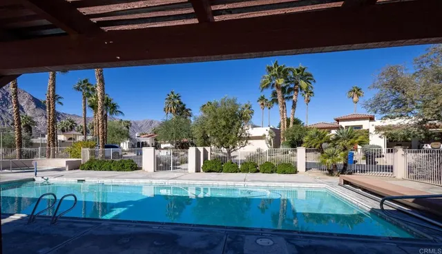a view of a house with a swimming pool