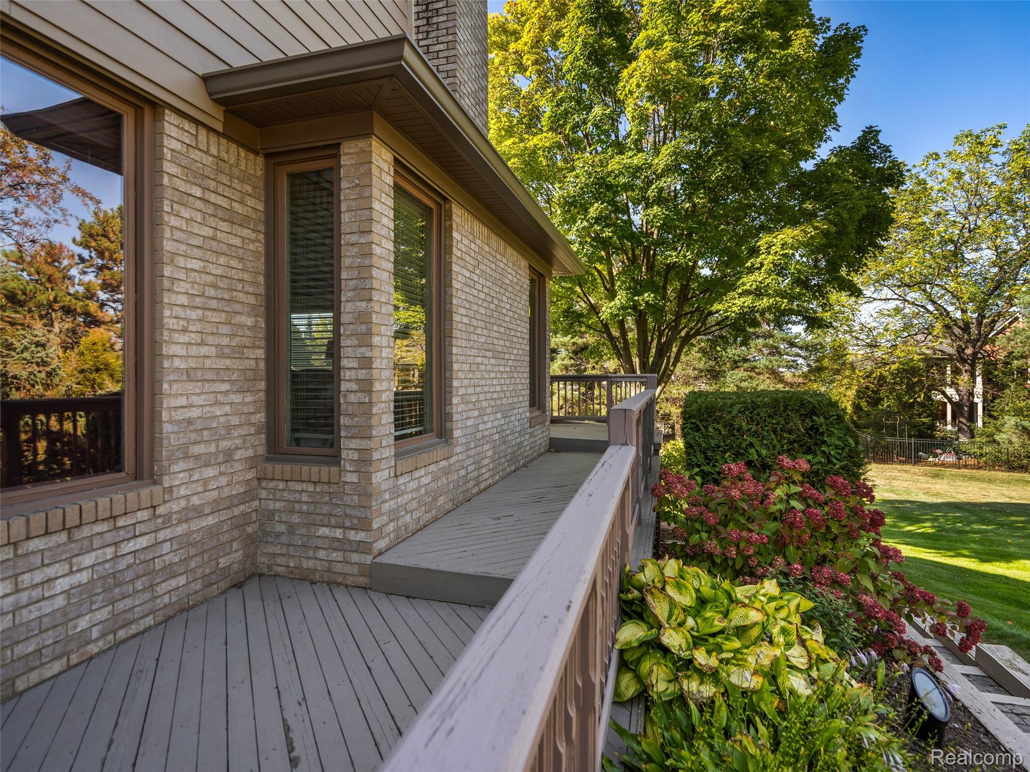 5724 Murfield Drive Rochester, MI 48306 - Photo 6 of 99 Wooden terrace featuring a yard