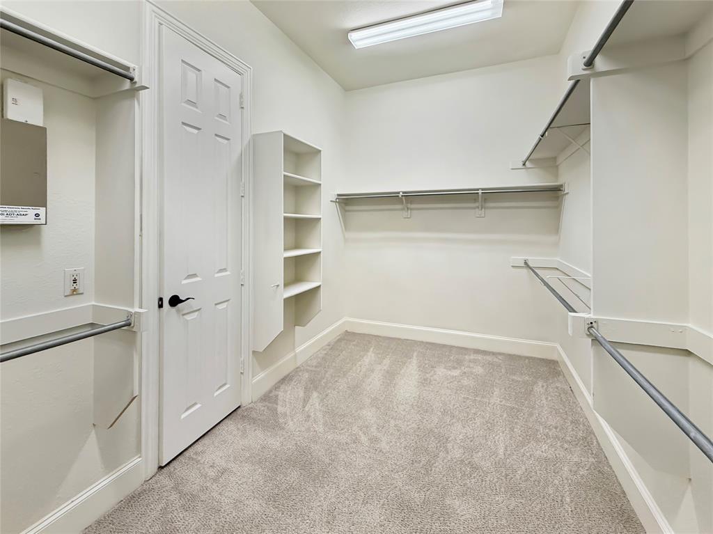 3779 Navarro Way Frisco, TX 75034 - Photo 11 of 17 a view of an empty walk in closet