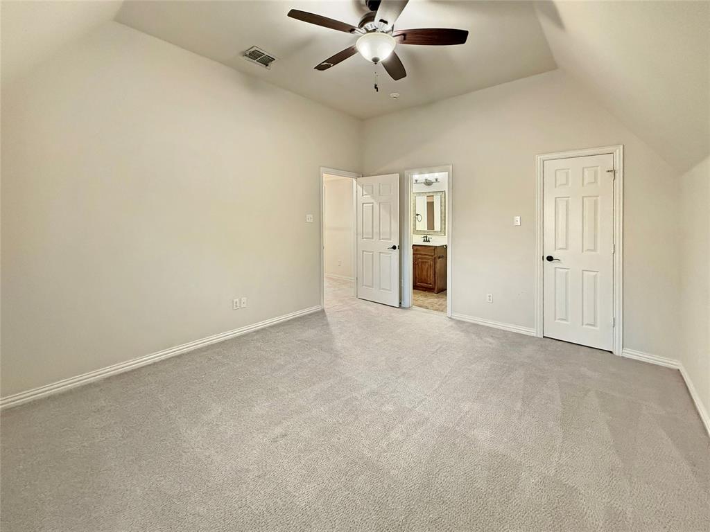 3779 Navarro Way Frisco, TX 75034 - Photo 12 of 17 an empty room with closet and a chandelier fan