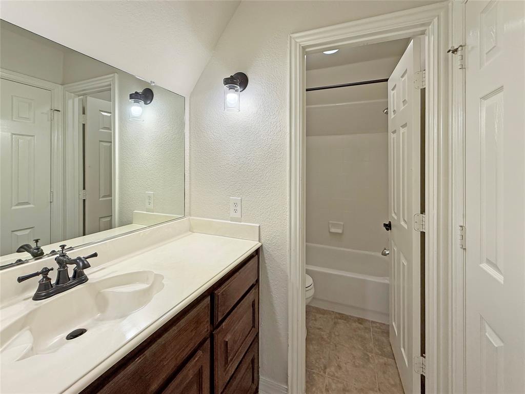 3779 Navarro Way Frisco, TX 75034 - Photo 13 of 17 a bathroom with a sink and a mirror