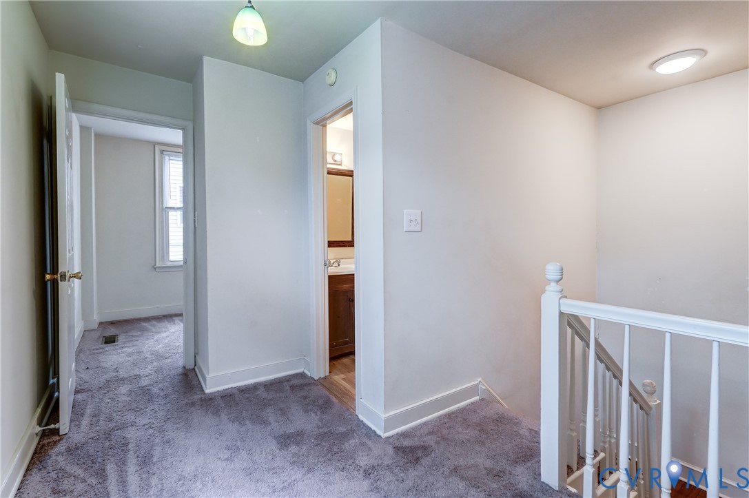 818 Spring Street Richmond, VA 23220 - Photo 15 of 28 a view of entryway with wooden floor