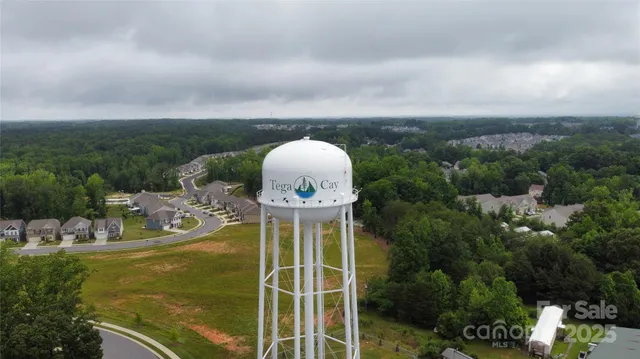 a view of a swimming pool with a table and chairs
