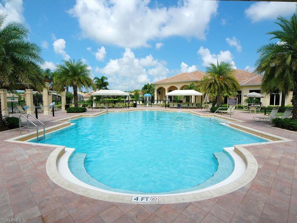 2346 Butterfly Palm Drive Naples, FL 34119 - Photo 18 of 45 Community pool with a patio and a gazebo