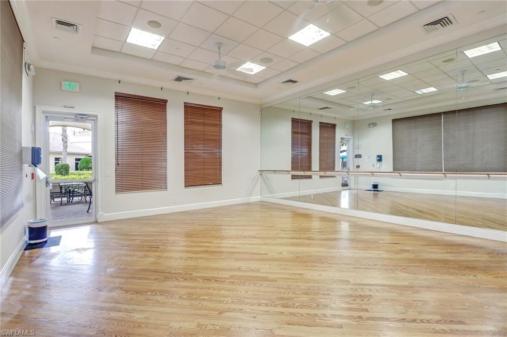2346 Butterfly Palm Drive Naples, FL 34119 - Photo 22 of 45 Workout room with a ceiling fan and a drop ceiling