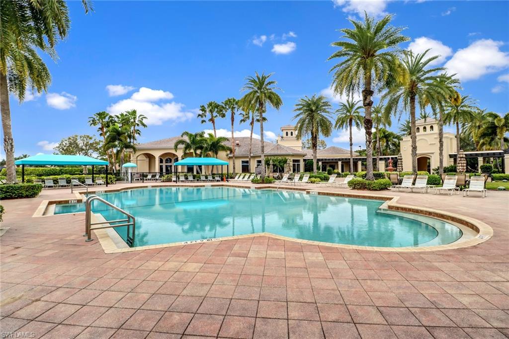 2346 Butterfly Palm Drive Naples, FL 34119 - Photo 32 of 45 Community pool featuring a patio