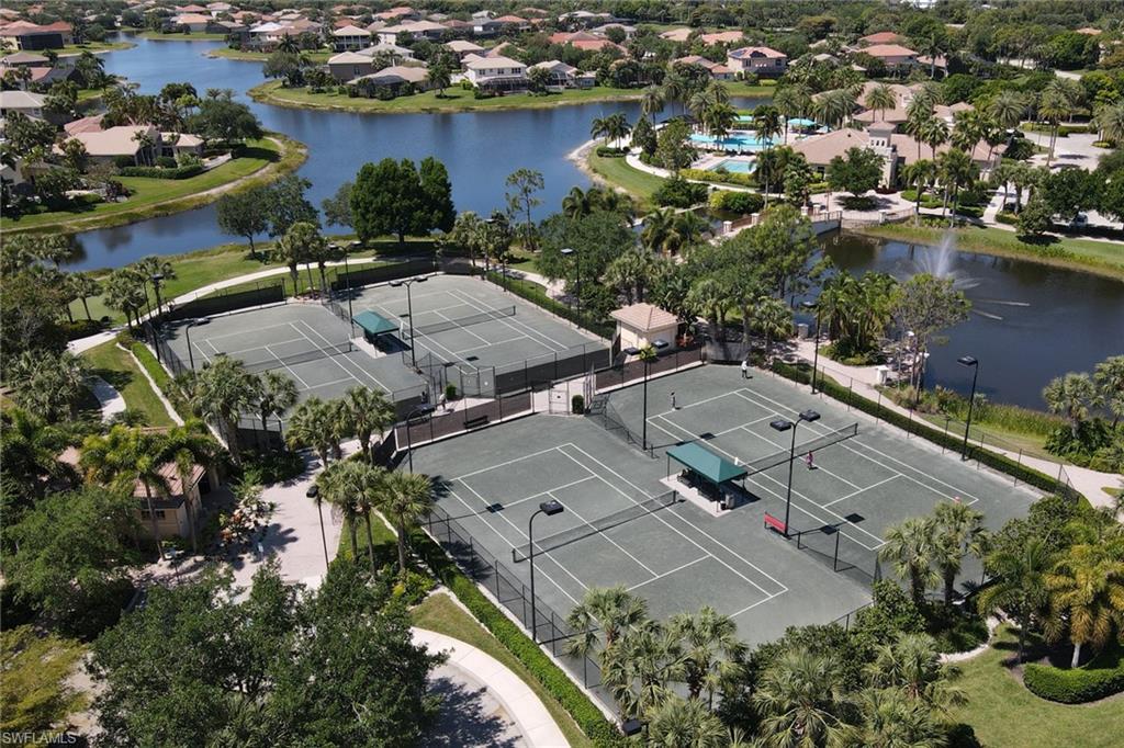 2346 Butterfly Palm Drive Naples, FL 34119 - Photo 37 of 45 Aerial perspective of suburban area featuring a large body of water