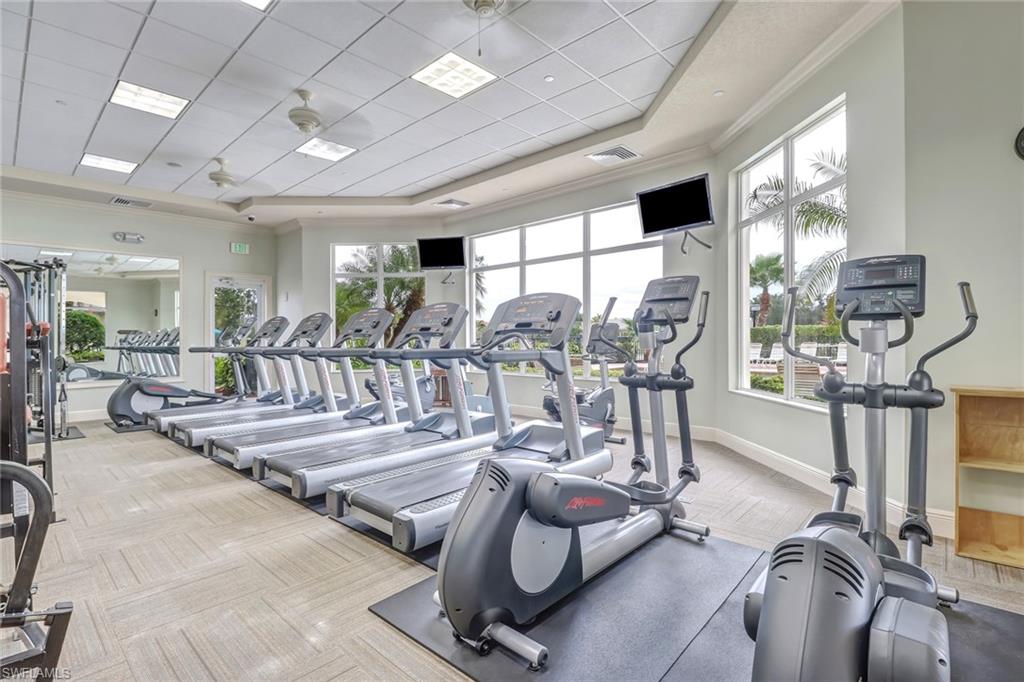 2346 Butterfly Palm Drive Naples, FL 34119 - Photo 41 of 45 Gym with crown molding and a paneled ceiling