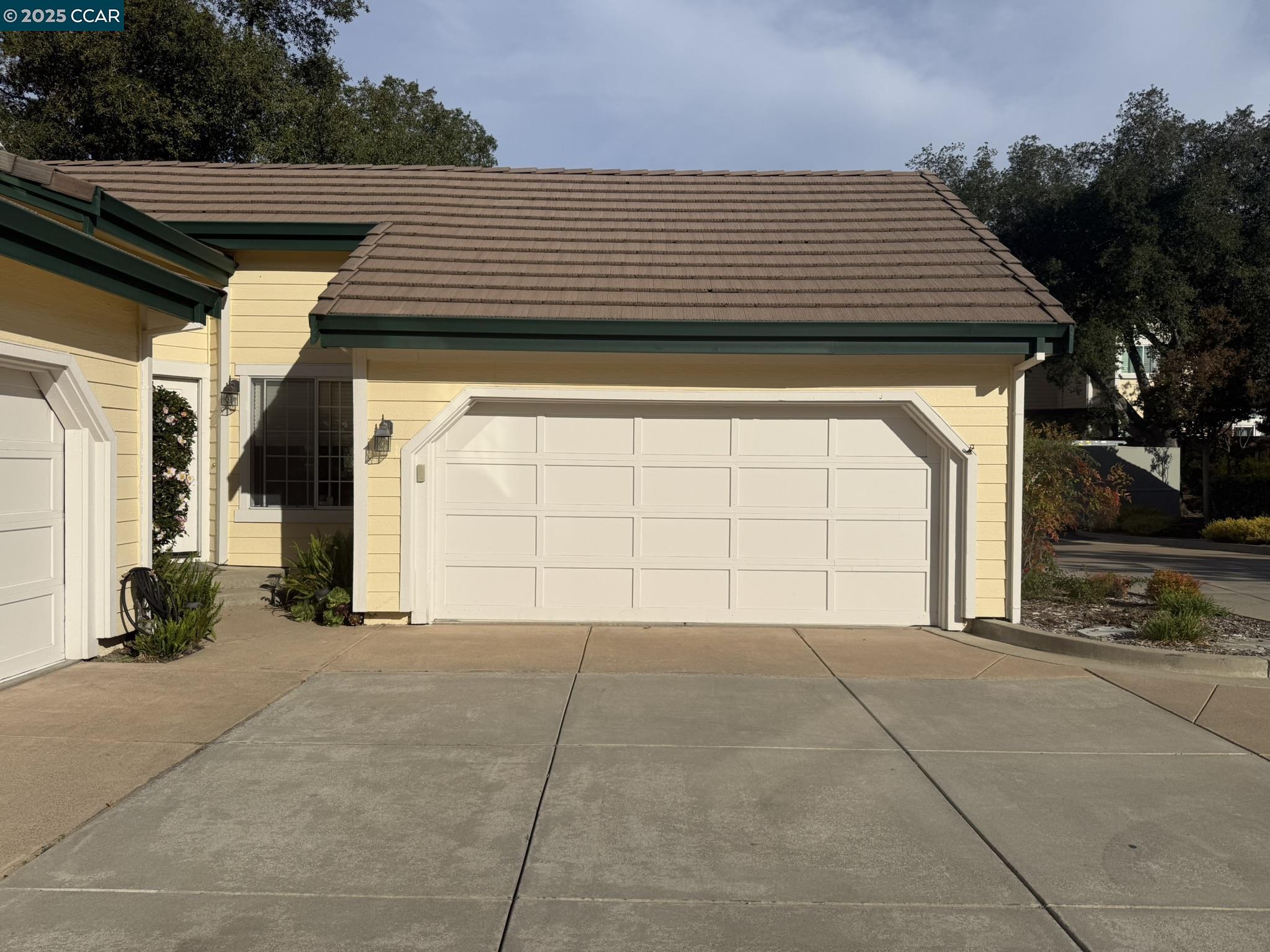 1183 Shell Lane Clayton, CA 94517 - Photo 1 of 1 a view of a house with a garage