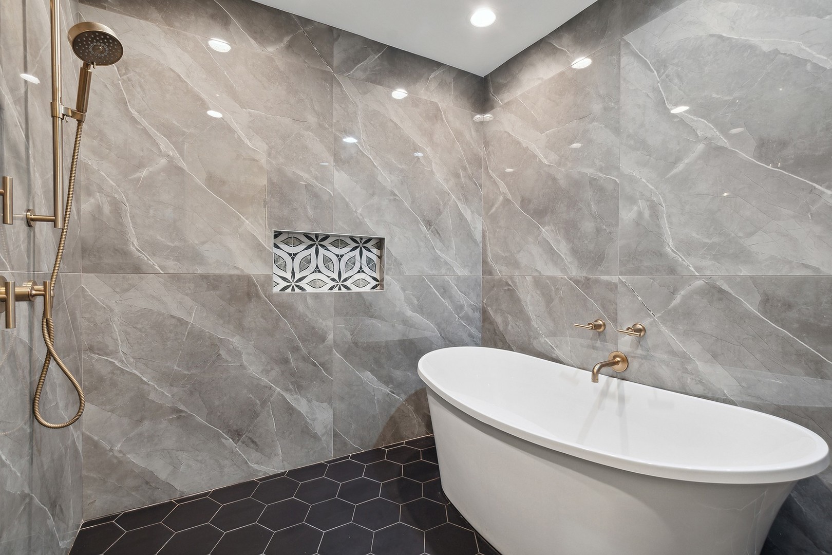 1435 Pfingsten Road Northbrook, IL 60062 - Photo 11 of 17 a white tub sitting next to a white sink