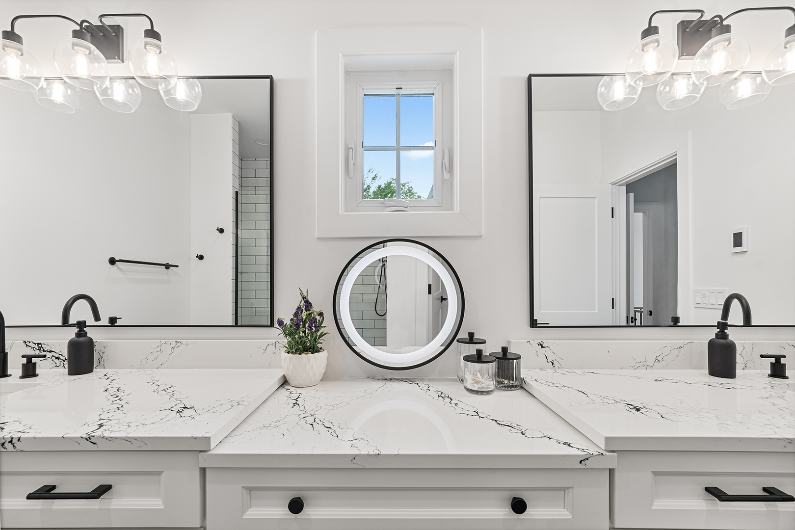 1435 Pfingsten Road Northbrook, IL 60062 - Photo 9 of 17 a bathroom with a sink and a mirror