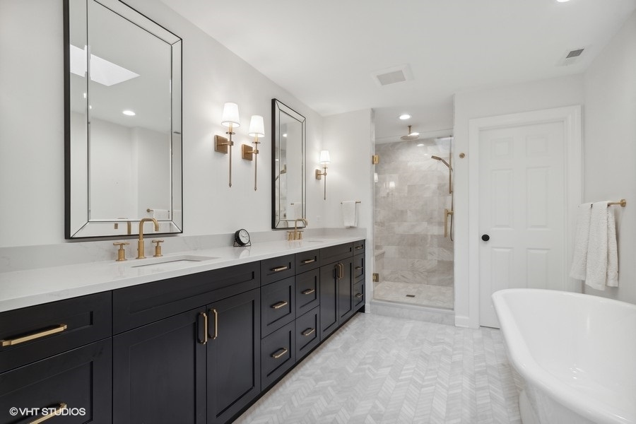 1435 Pfingsten Road Northbrook, IL 60062 - Photo 10 of 17 a spacious bathroom with a double vanity sink mirror double and bathtub