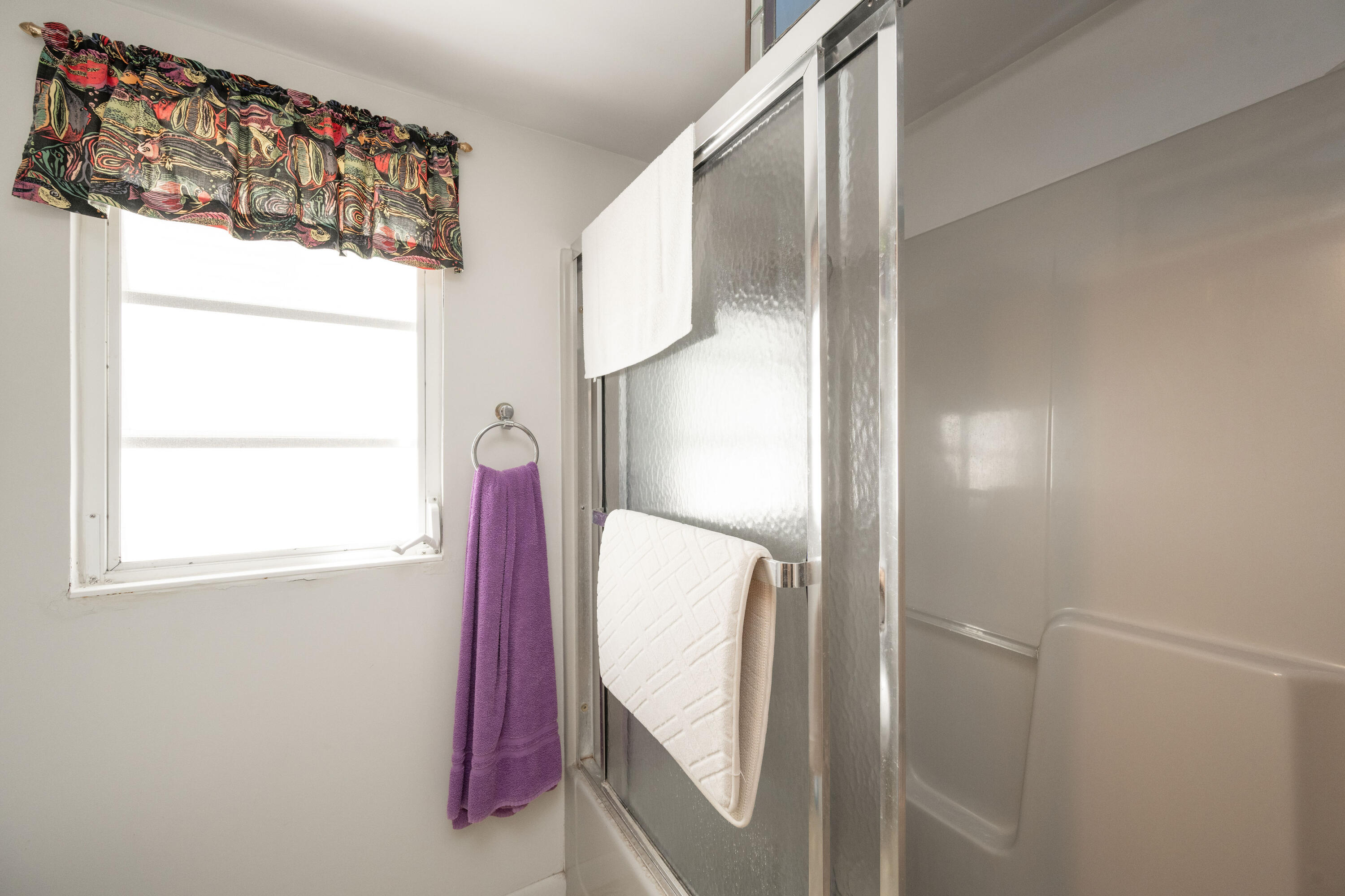 138 Sea Lane Key West, FL 33040 - Photo 13 of 31 a bathroom with a mirror and a shower
