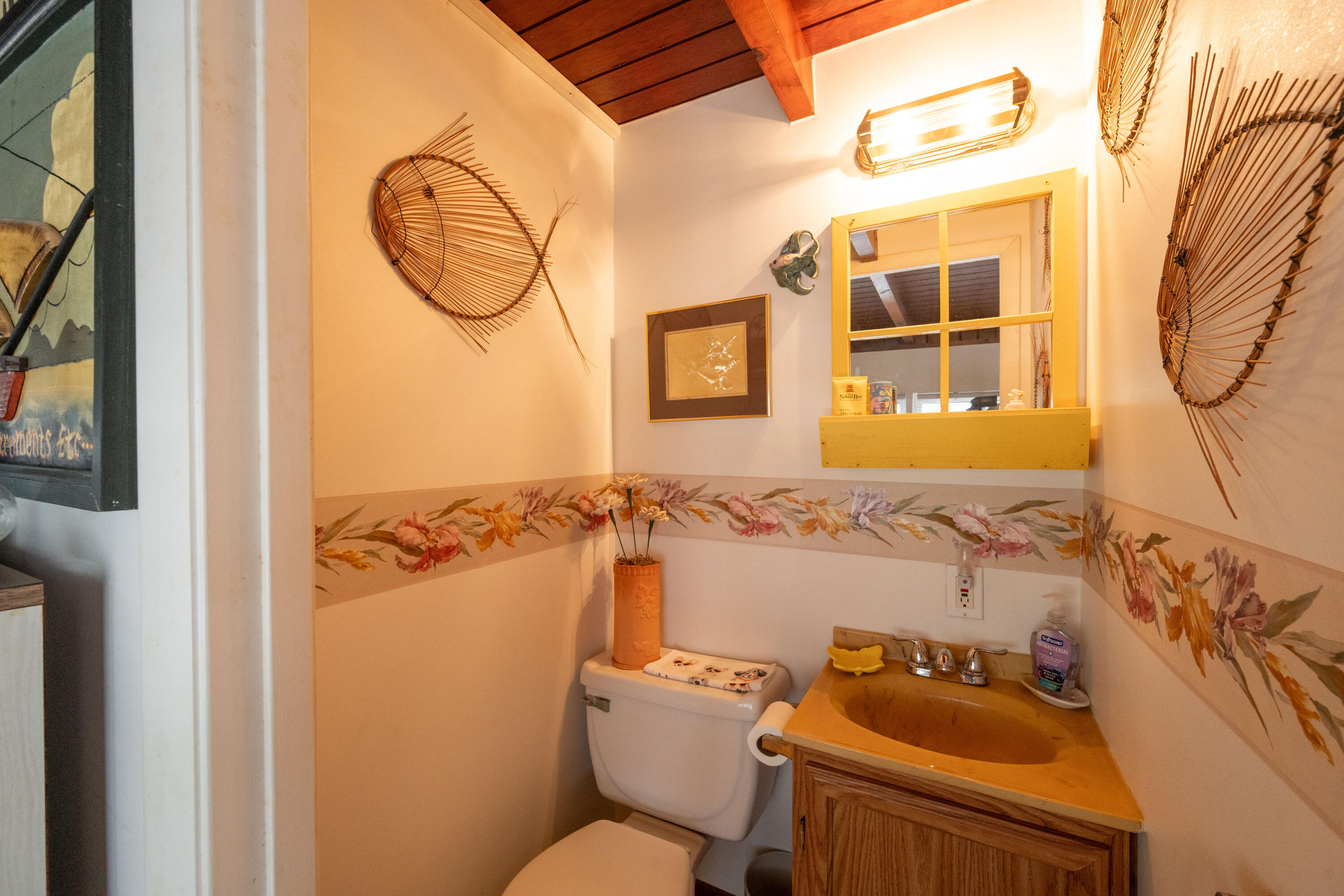 138 Sea Lane Key West, FL 33040 - Photo 14 of 31 a bathroom with a sink and mirror with toilet
