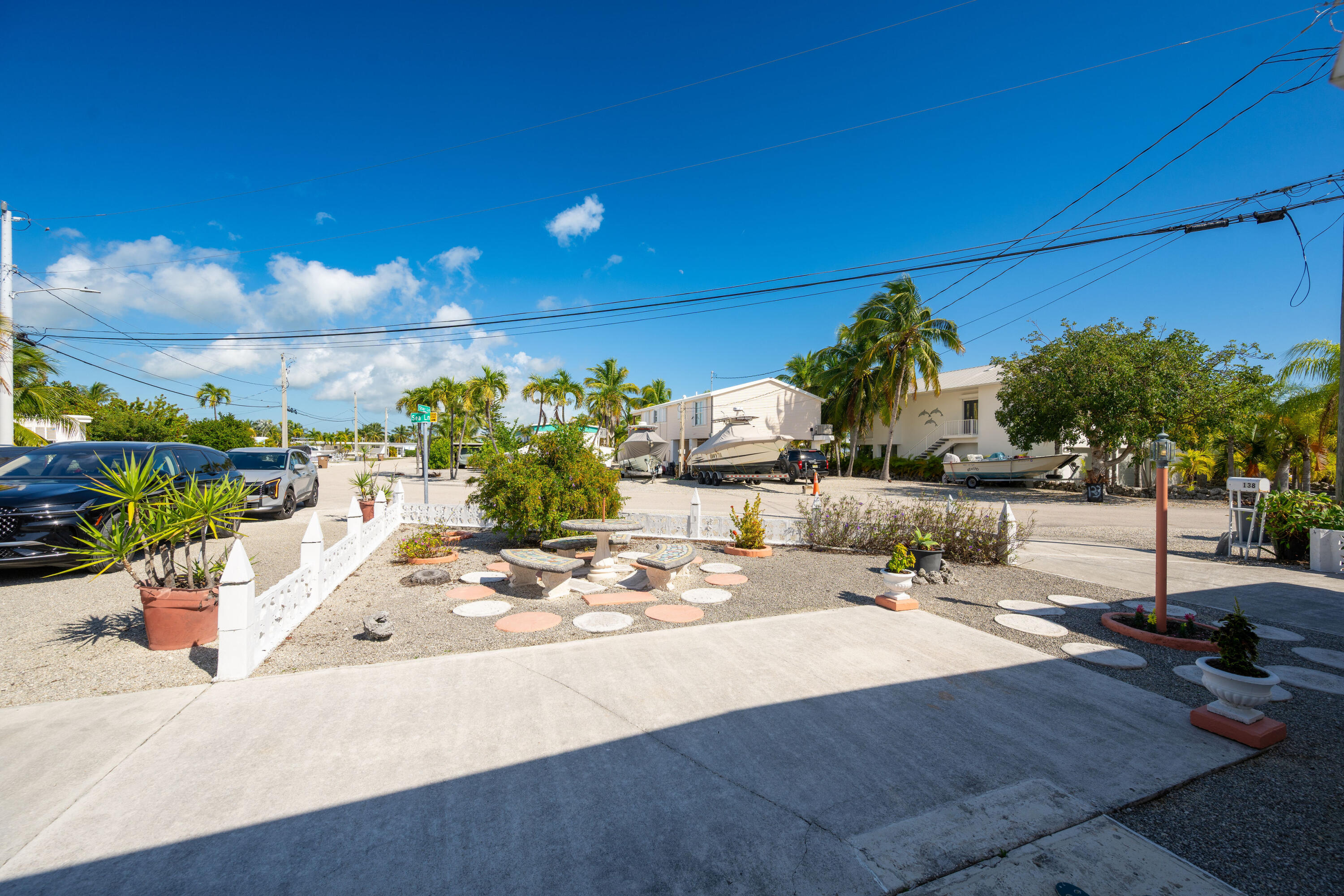 138 Sea Lane Key West, FL 33040 - Photo 25 of 31 a view of a patio with swimming pool