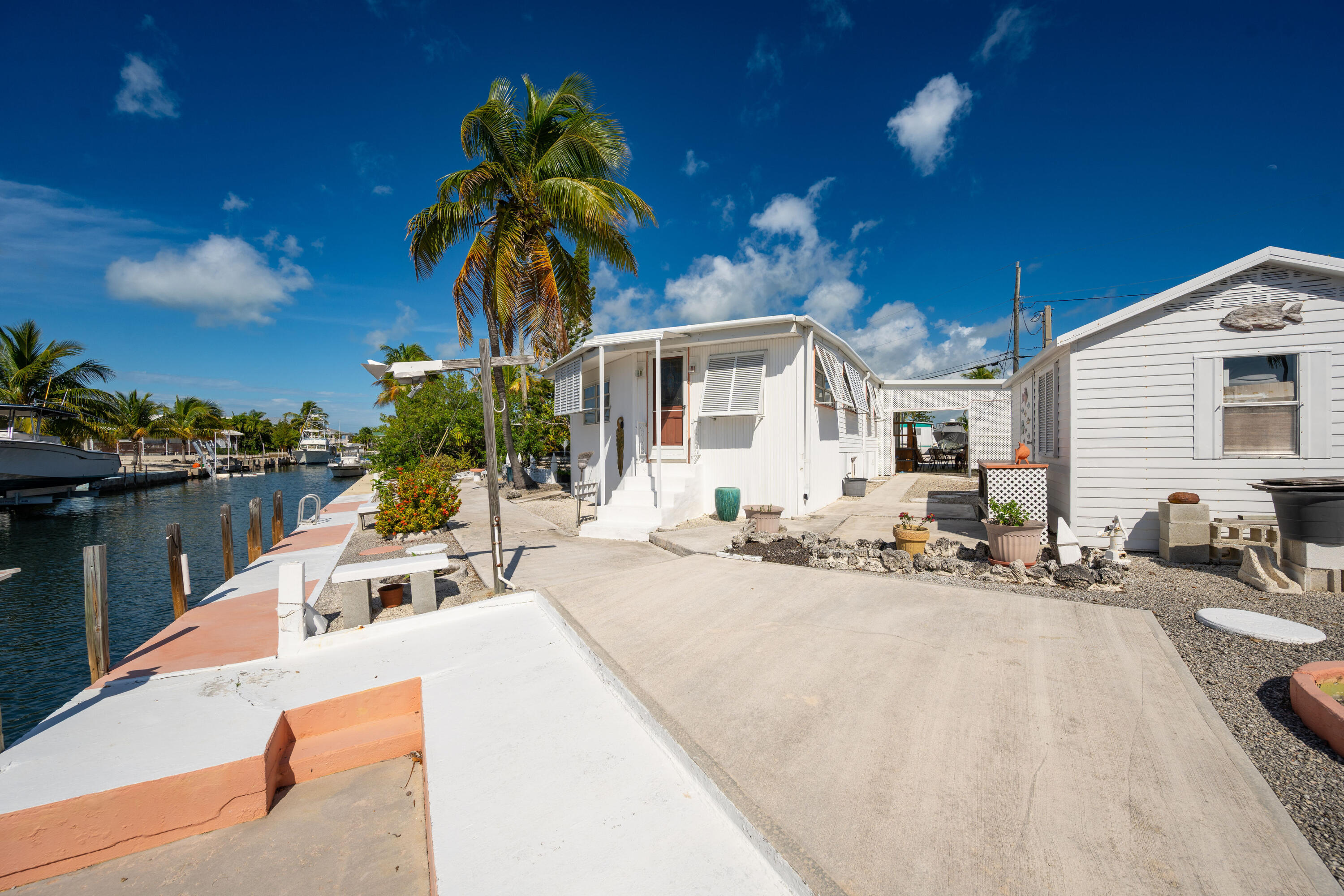138 Sea Lane Key West, FL 33040 - Photo 26 of 31 a view of a house with backyard and sitting area