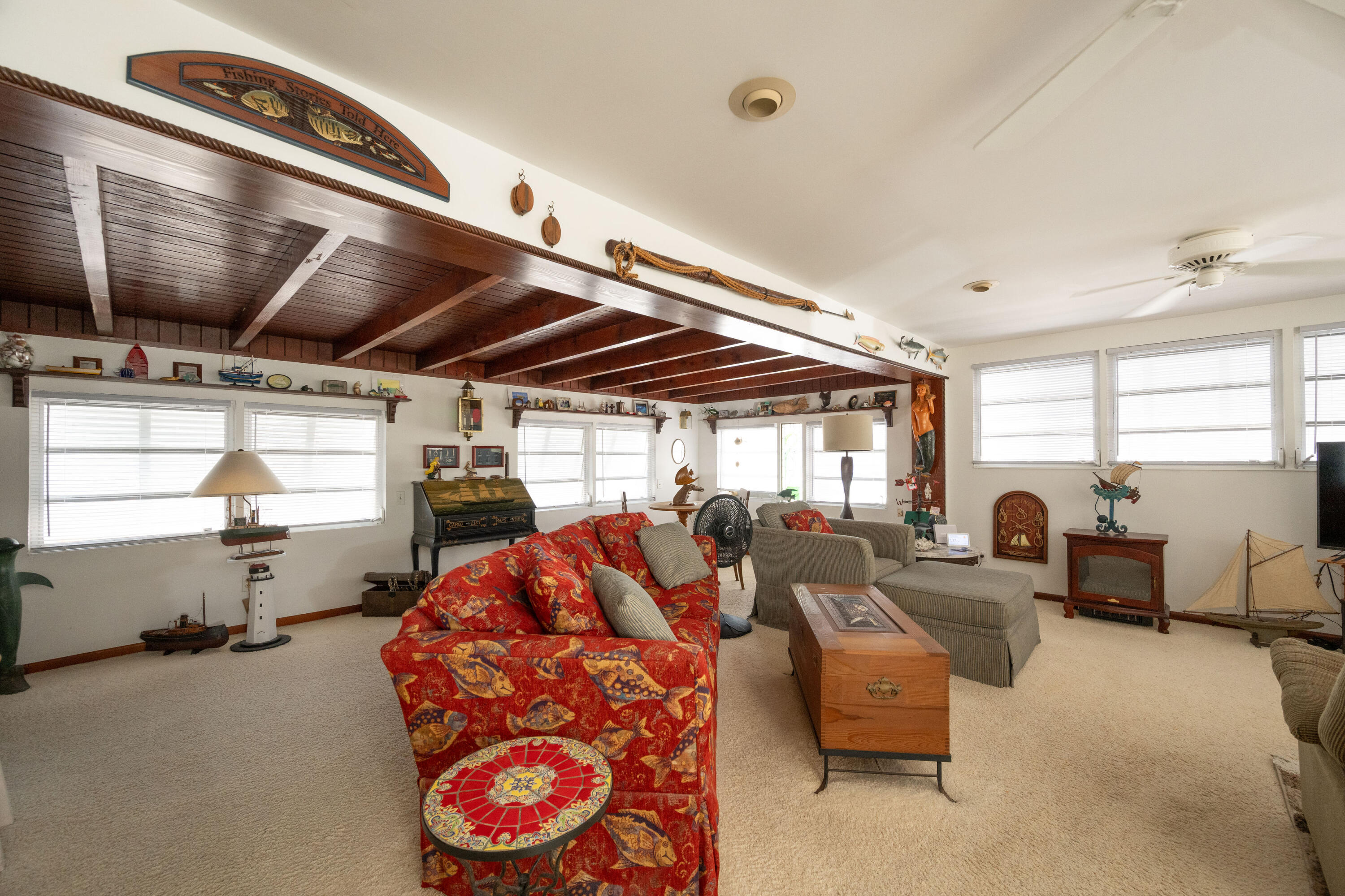 138 Sea Lane Key West, FL 33040 - Photo 7 of 31 a living room with furniture a air conditioner vent and a window