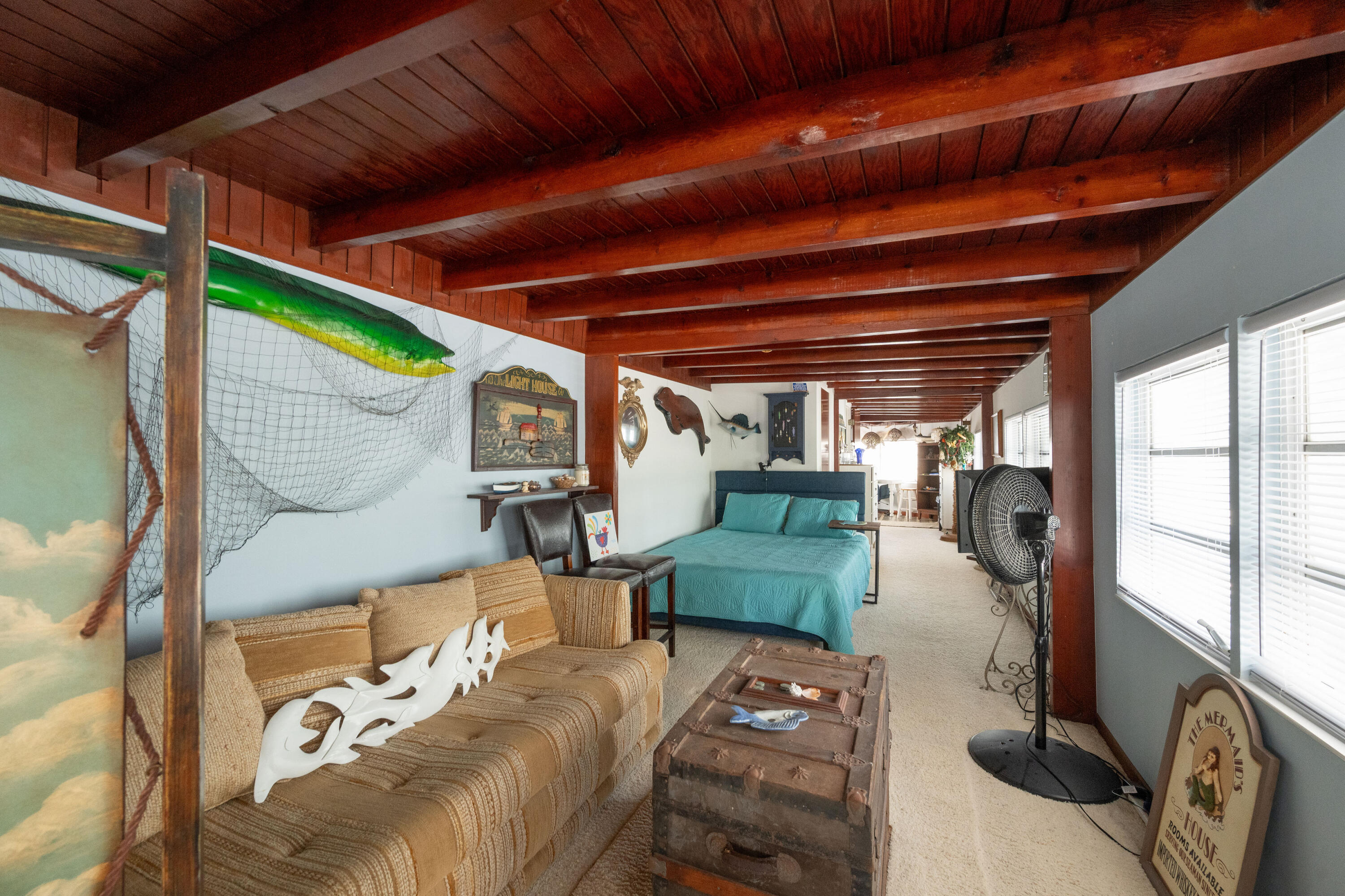 138 Sea Lane Key West, FL 33040 - Photo 9 of 31 a view of living room with furniture and a window