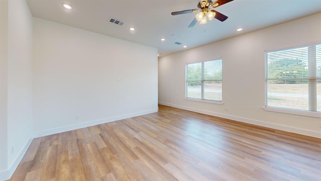 373 Buck Ridge Drive Frisco, TX 75068 - Photo 6 of 24 Recessed lighting, wood-finish flooring, and two windows with blinds