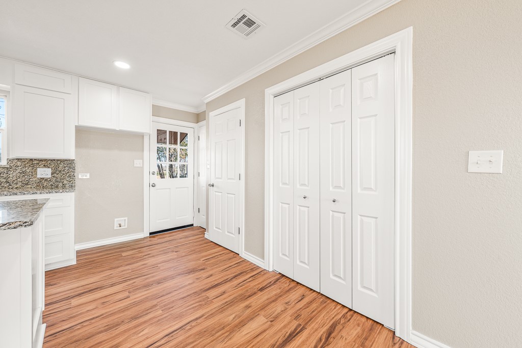 8896 Gholson Road Waco, TX 76705 - Photo 9 of 58 a view of a livingroom with wooden floor