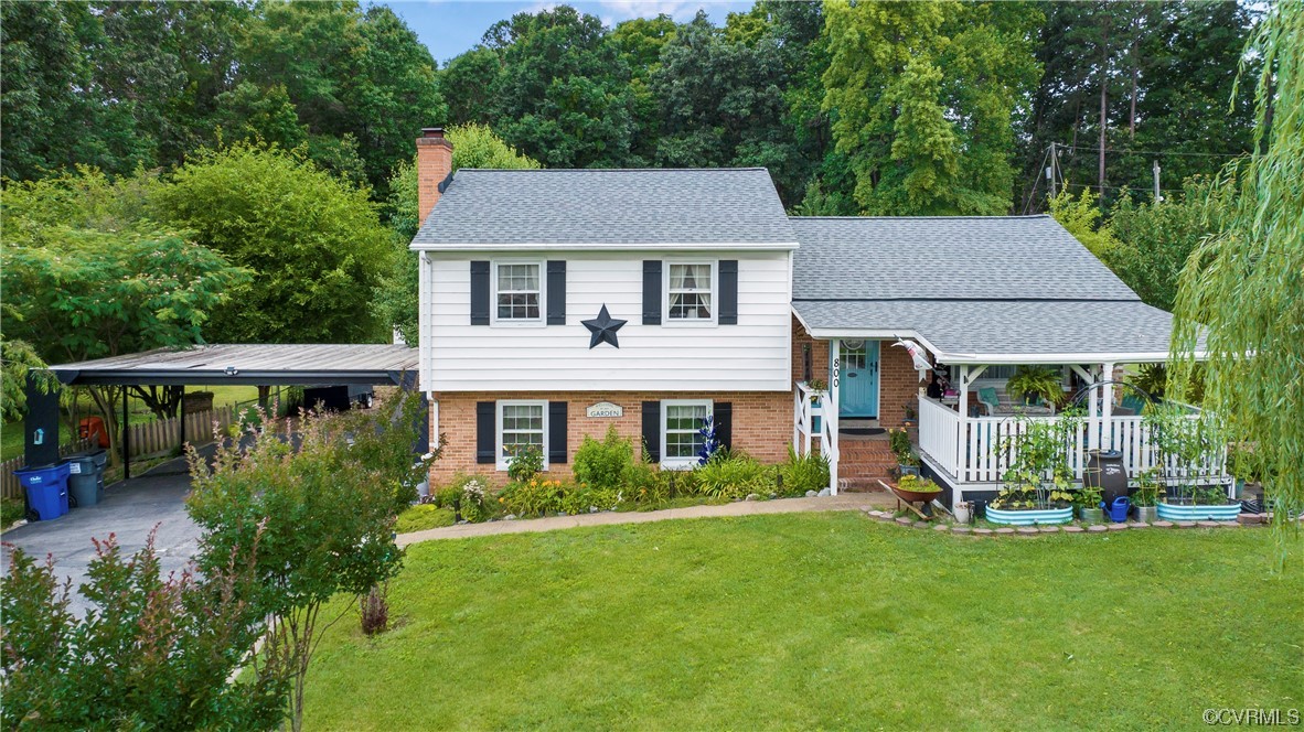 front view of a house with a yard
