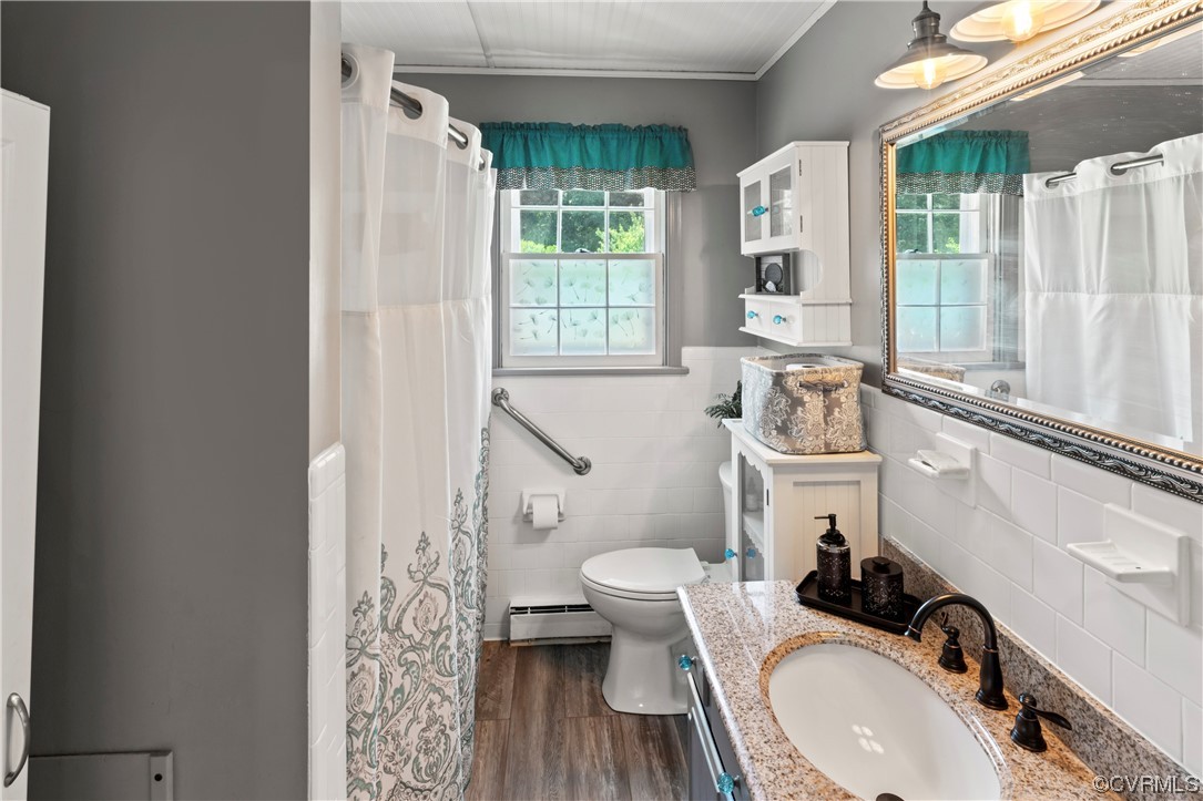800 Adkins Road Chesterfield, VA 23236 - Photo 11 of 37 a bath room with a sink and a toilet