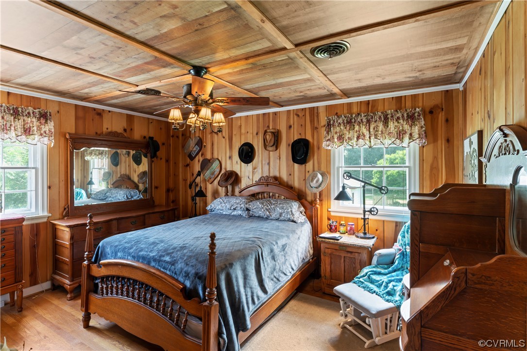 800 Adkins Road Chesterfield, VA 23236 - Photo 12 of 37 a bedroom with a bed and wooden floor