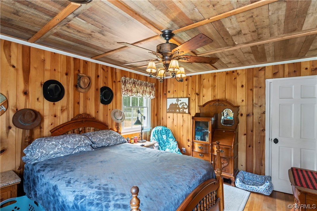 800 Adkins Road Chesterfield, VA 23236 - Photo 13 of 37 a bedroom with a bed and wooden floor