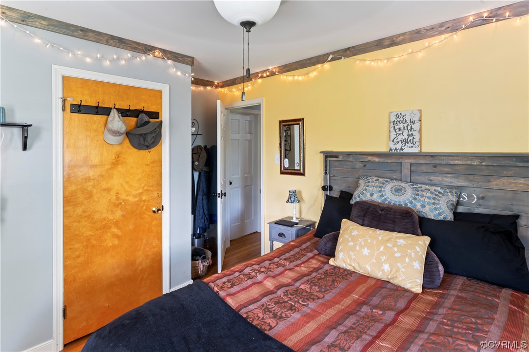 800 Adkins Road Chesterfield, VA 23236 - Photo 15 of 37 a bedroom with a bed and a table