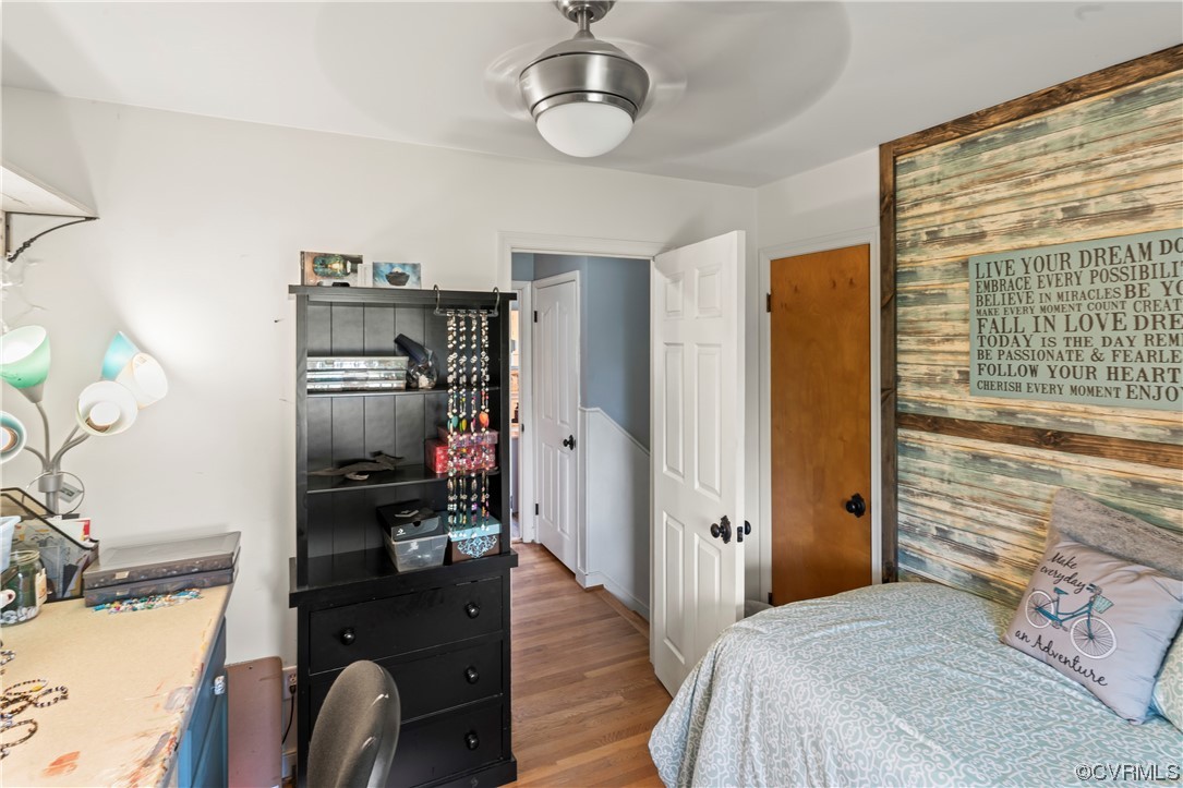 800 Adkins Road Chesterfield, VA 23236 - Photo 17 of 37 a bedroom with a bed cabinets and a large window