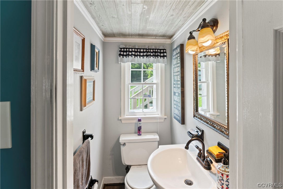 800 Adkins Road Chesterfield, VA 23236 - Photo 19 of 37 a bathroom with a sink and a mirror