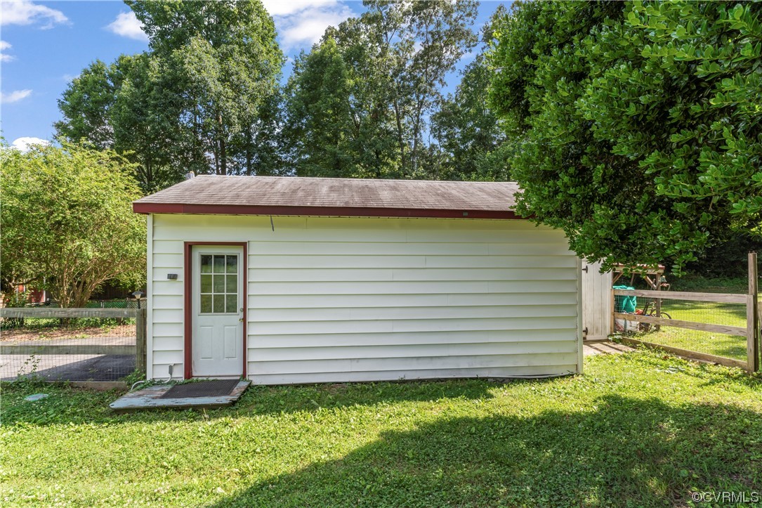 800 Adkins Road Chesterfield, VA 23236 - Photo 27 of 37 a view of a backyard with plants and large tree