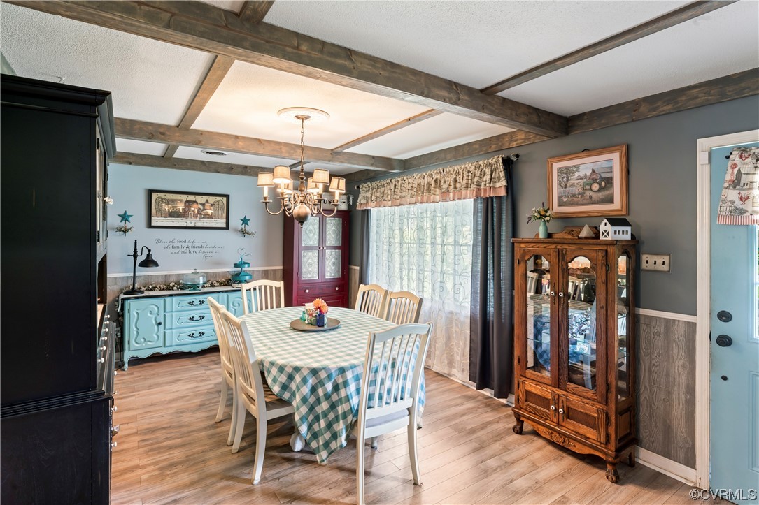 800 Adkins Road Chesterfield, VA 23236 - Photo 3 of 37 a view of a dining room with furniture window and wooden floor