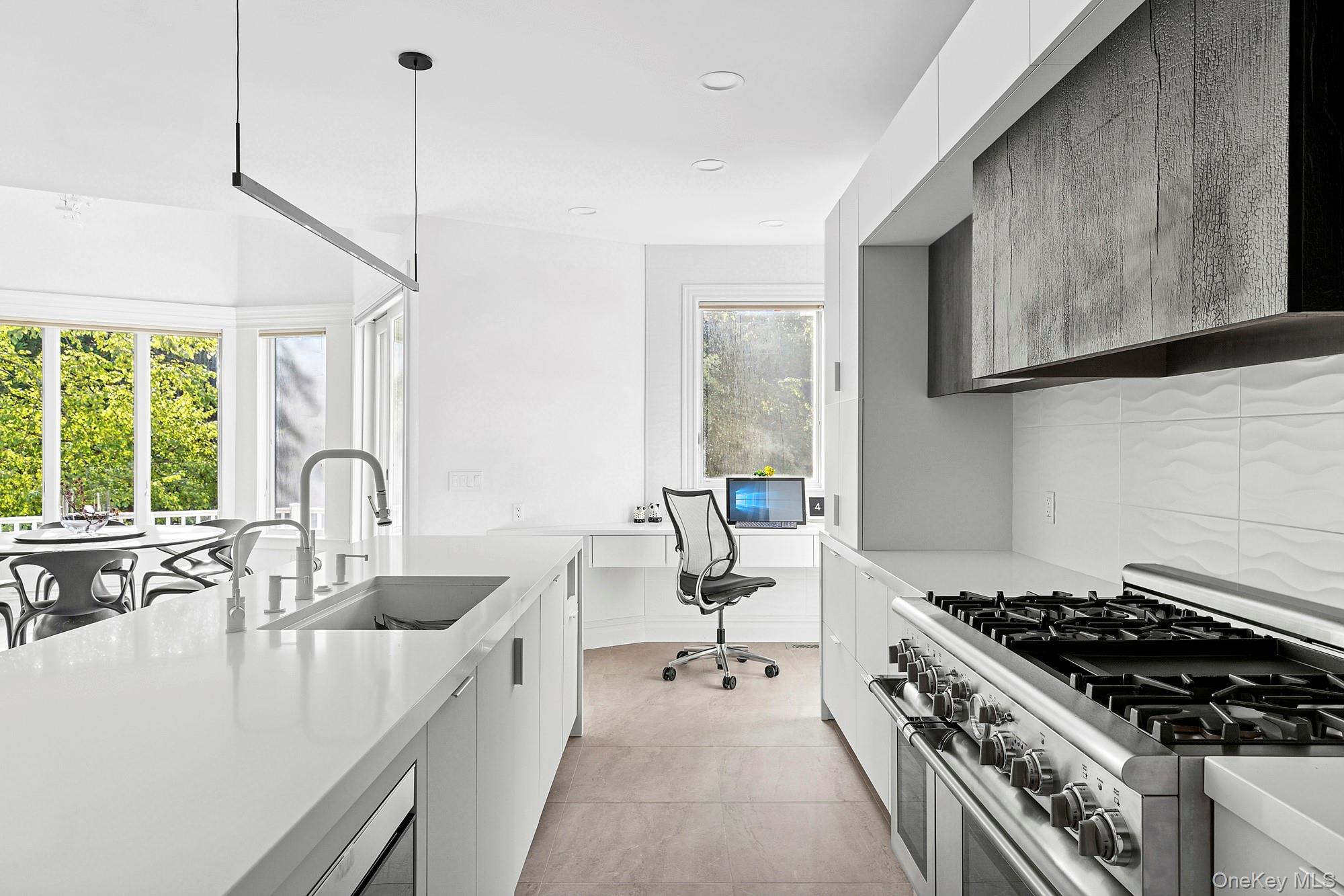 144 Round Swamp Road Huntington, NY 11743 - Photo 11 of 39 a kitchen with sink stove and cabinets