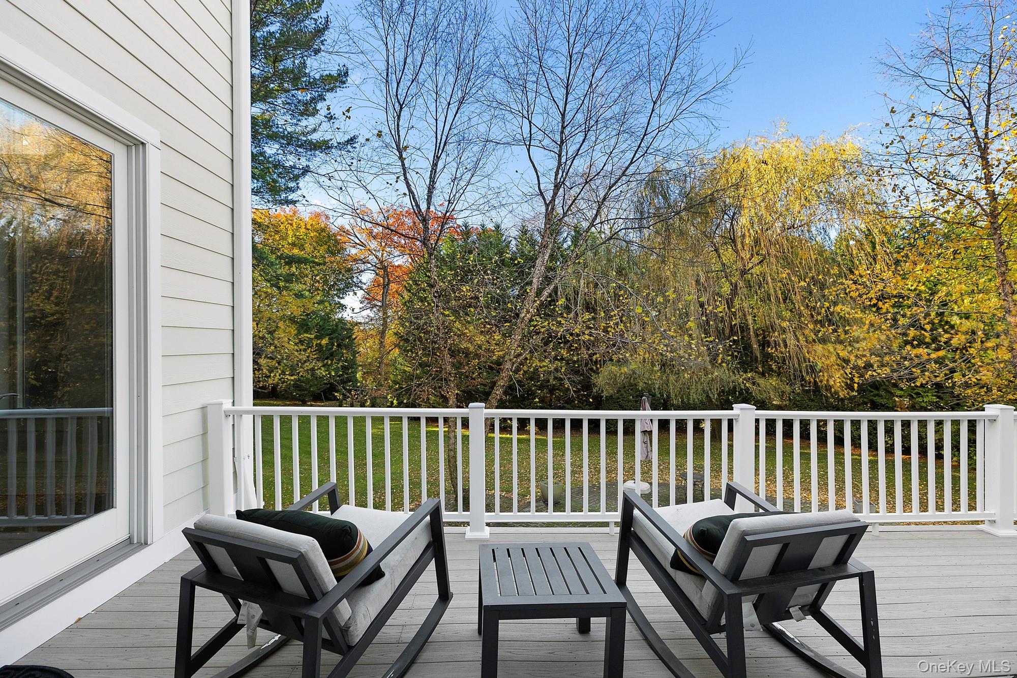 144 Round Swamp Road Huntington, NY 11743 - Photo 18 of 39 a view of a chair and table in the balcony