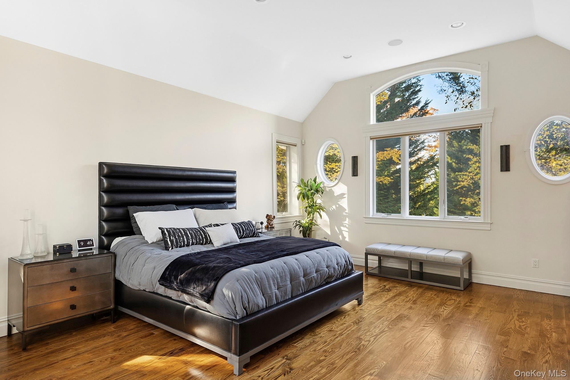 144 Round Swamp Road Huntington, NY 11743 - Photo 22 of 39 a bedroom with a bed and a window