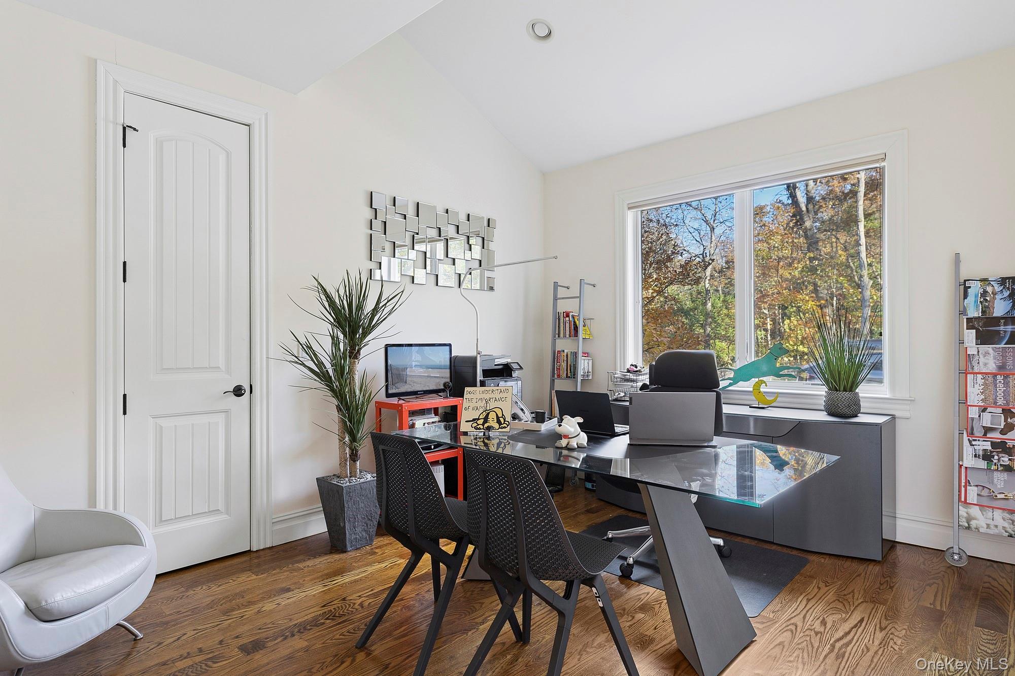 144 Round Swamp Road Huntington, NY 11743 - Photo 29 of 39 a dining room with furniture a window and wooden floor